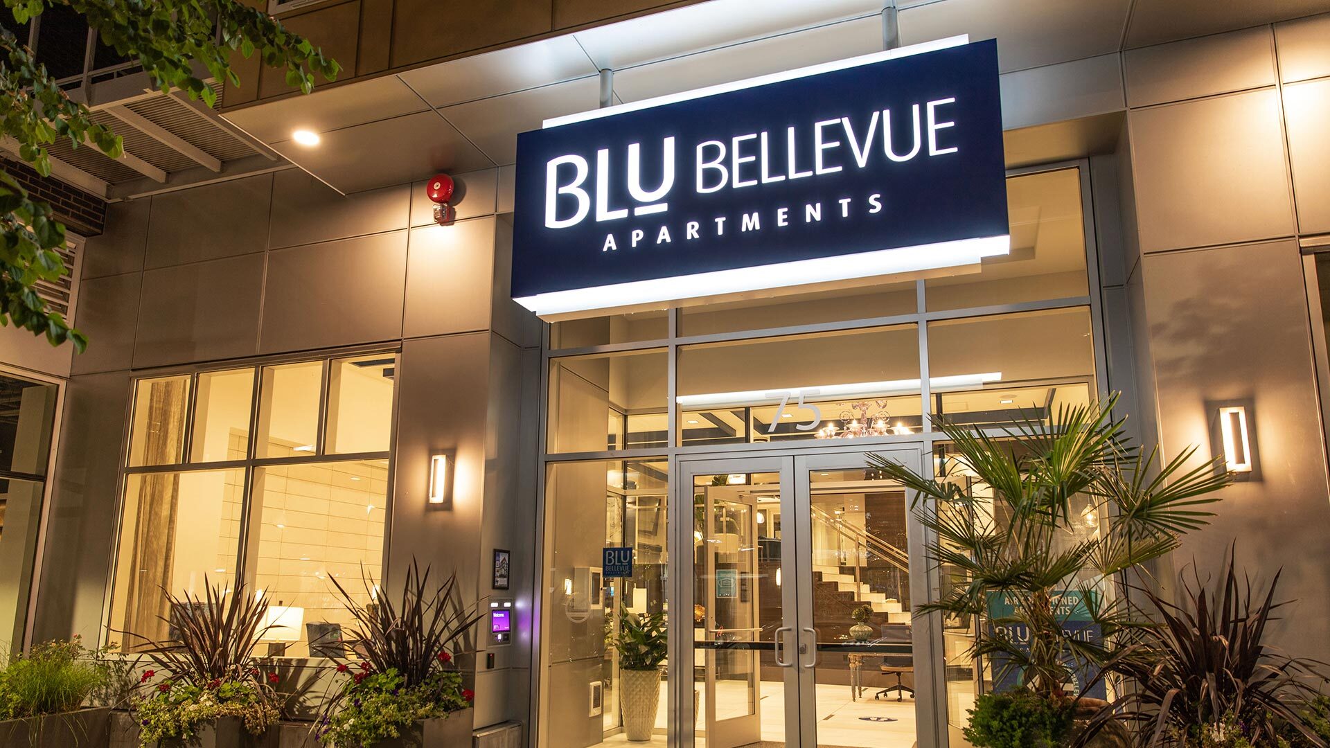 Blu bellevue front door sign evening