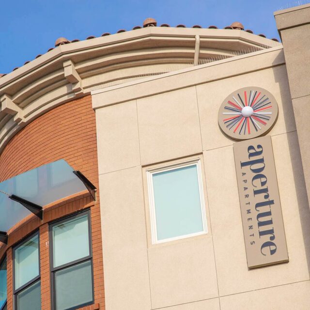 Aperture location building sign