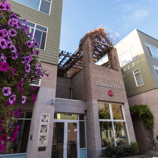 Broadway south building entrance with flowers