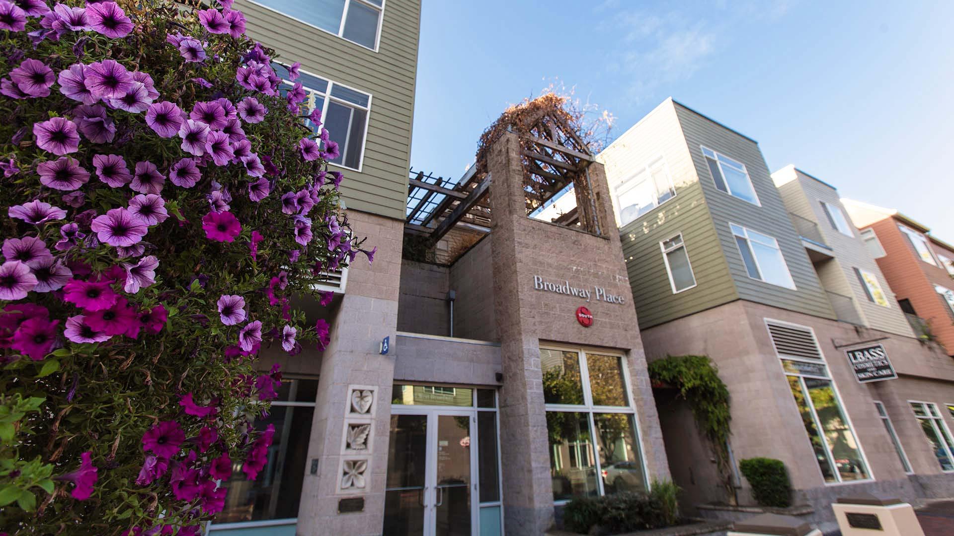 Broadway south building entrance with flowers