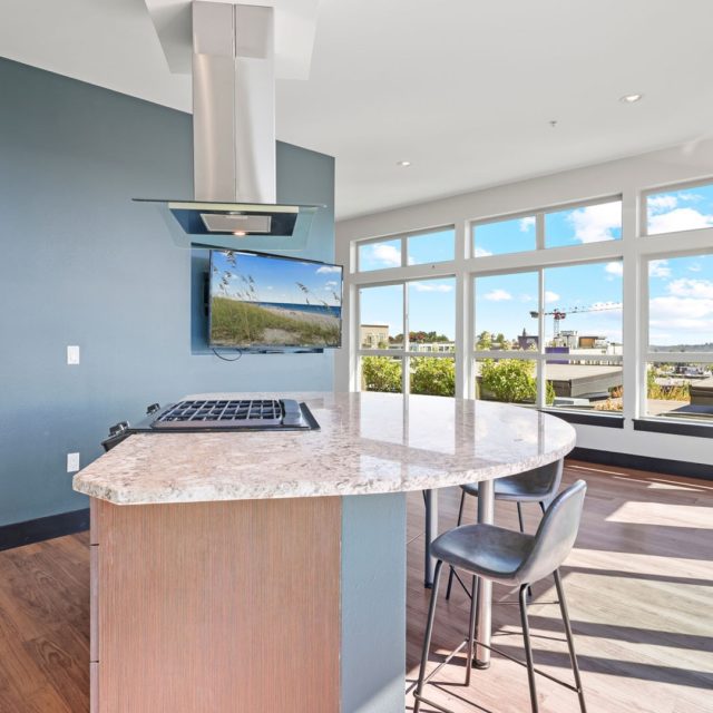 Collins on Pine Clubhouse Kitchen TV Blue Wall 17