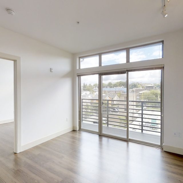 Collins on Pine 1 BR Living Room Balcony 02