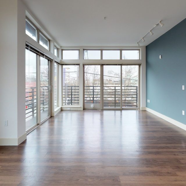 Collins on Pine 2 BR Living Room Balcony 01