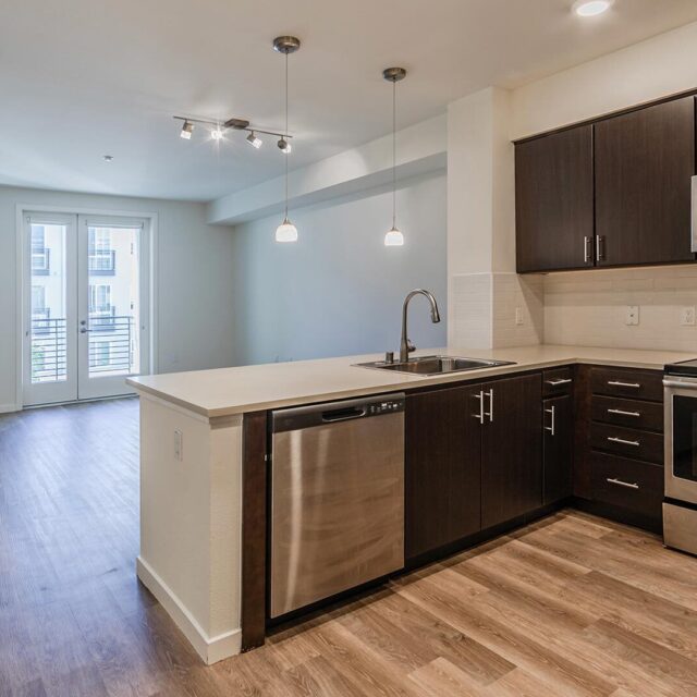 The lark cypress 1br kitchen island view