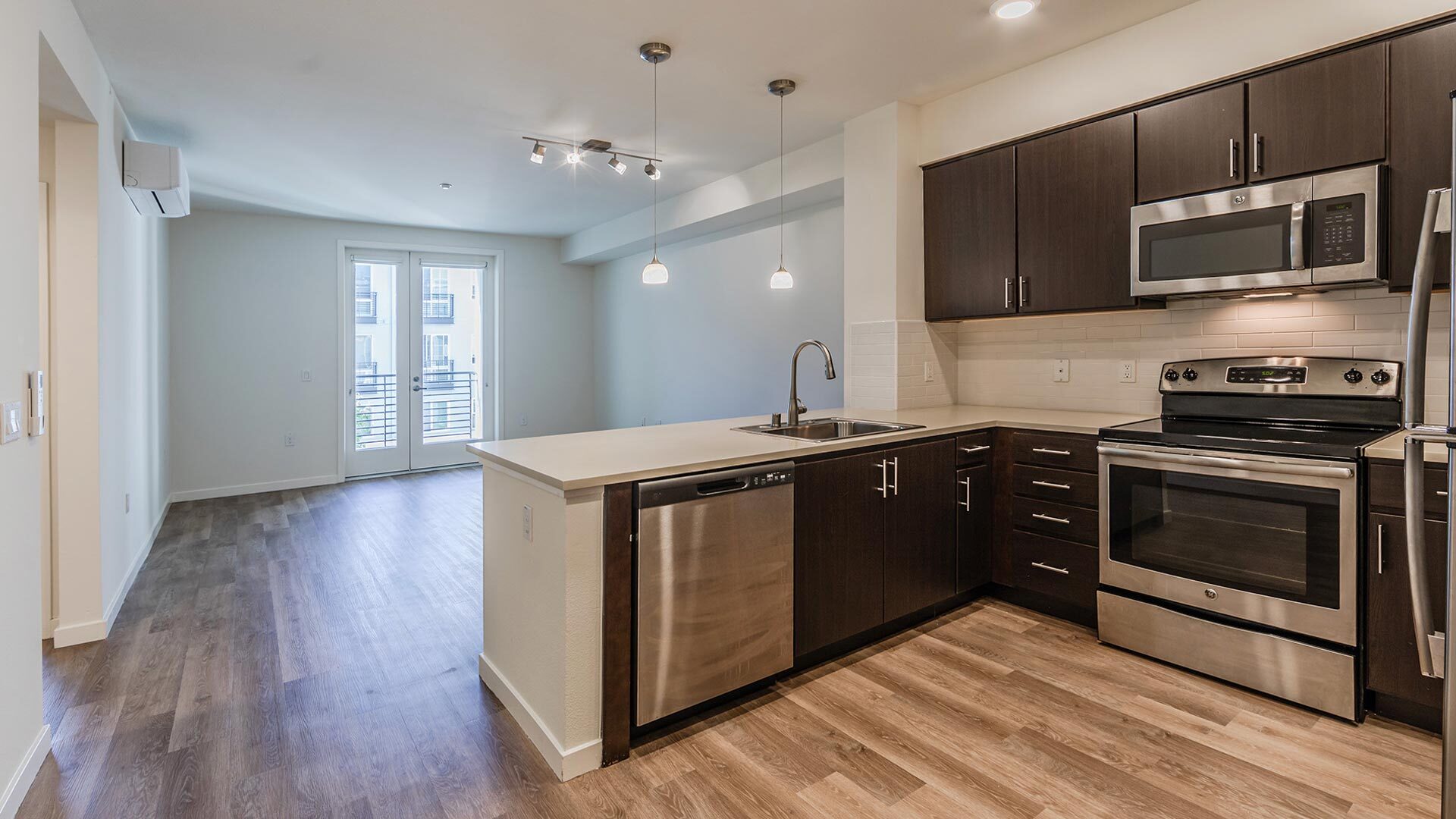 The lark cypress 1br kitchen island view