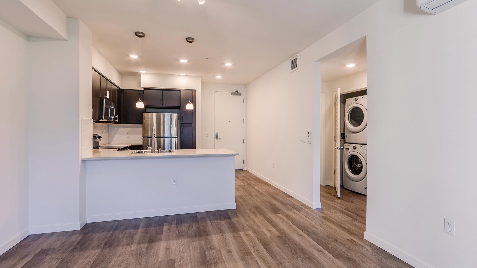 The lark cypress 1br kitchen laundry view