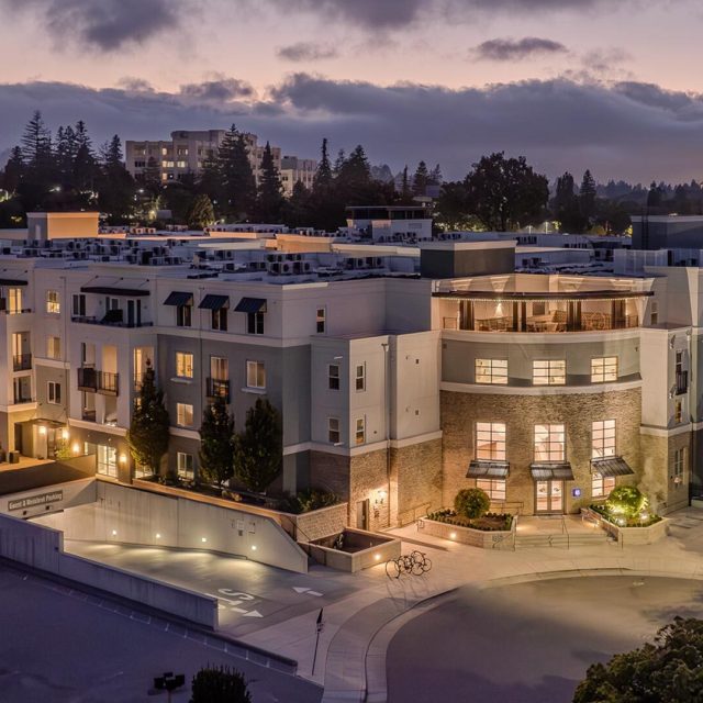 The lark san mateo exterior evening aerial view 2