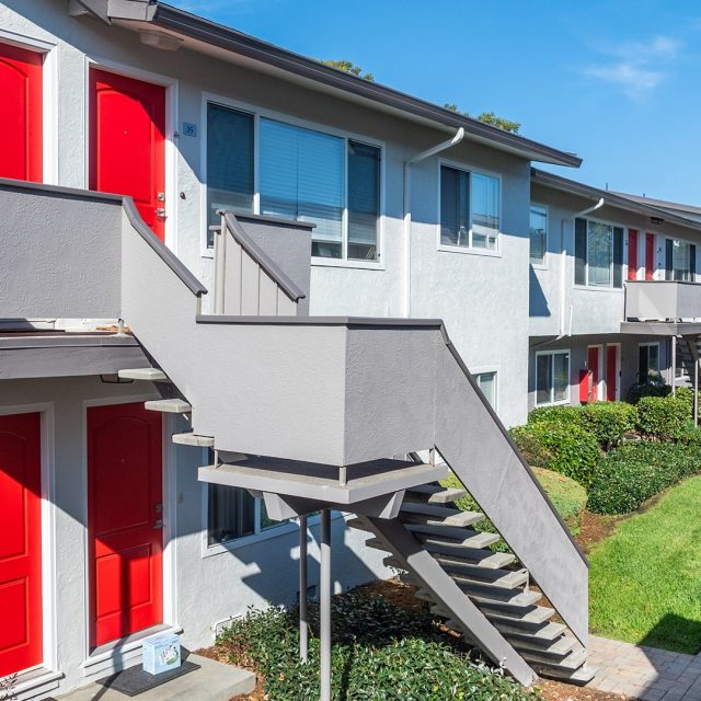 Marina plaza courtyard stairs red doors