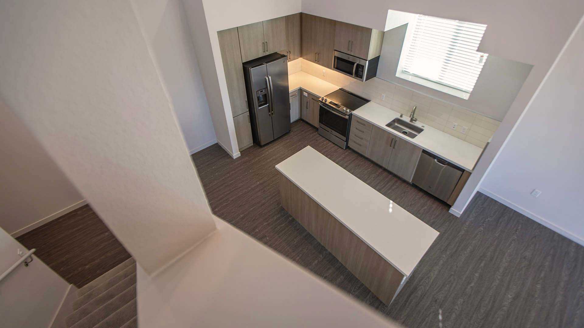 Mira plan D Loft kitchen island view 3