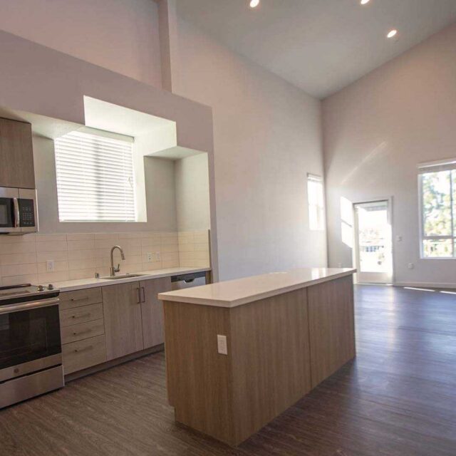 Mira plan D Loft kitchen island view 2