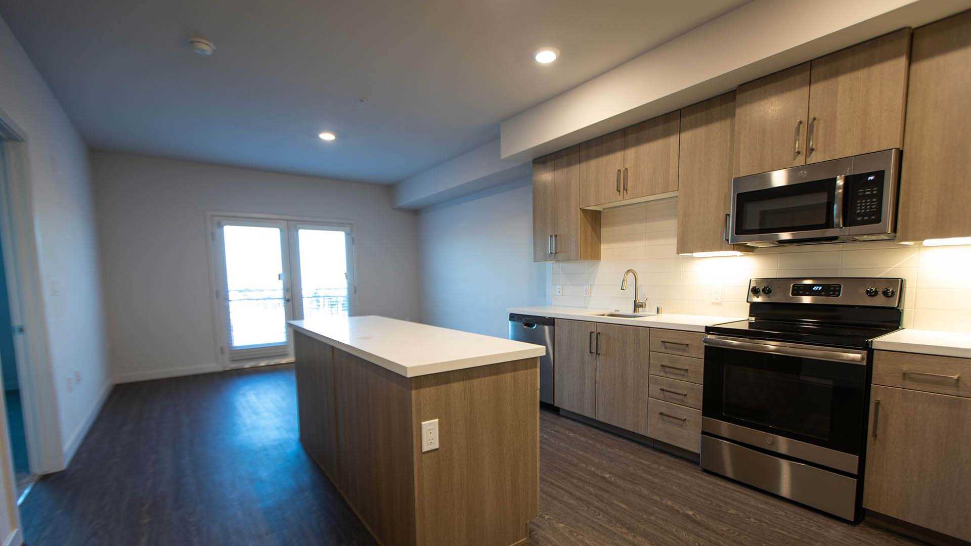 Mira plan E kitchen island view 1