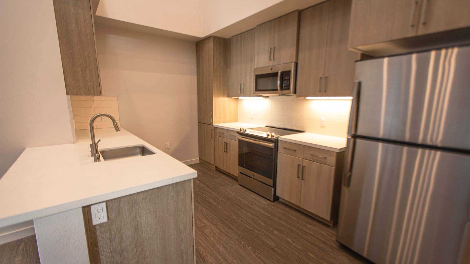 Mira plan H Loft kitchen island view 1