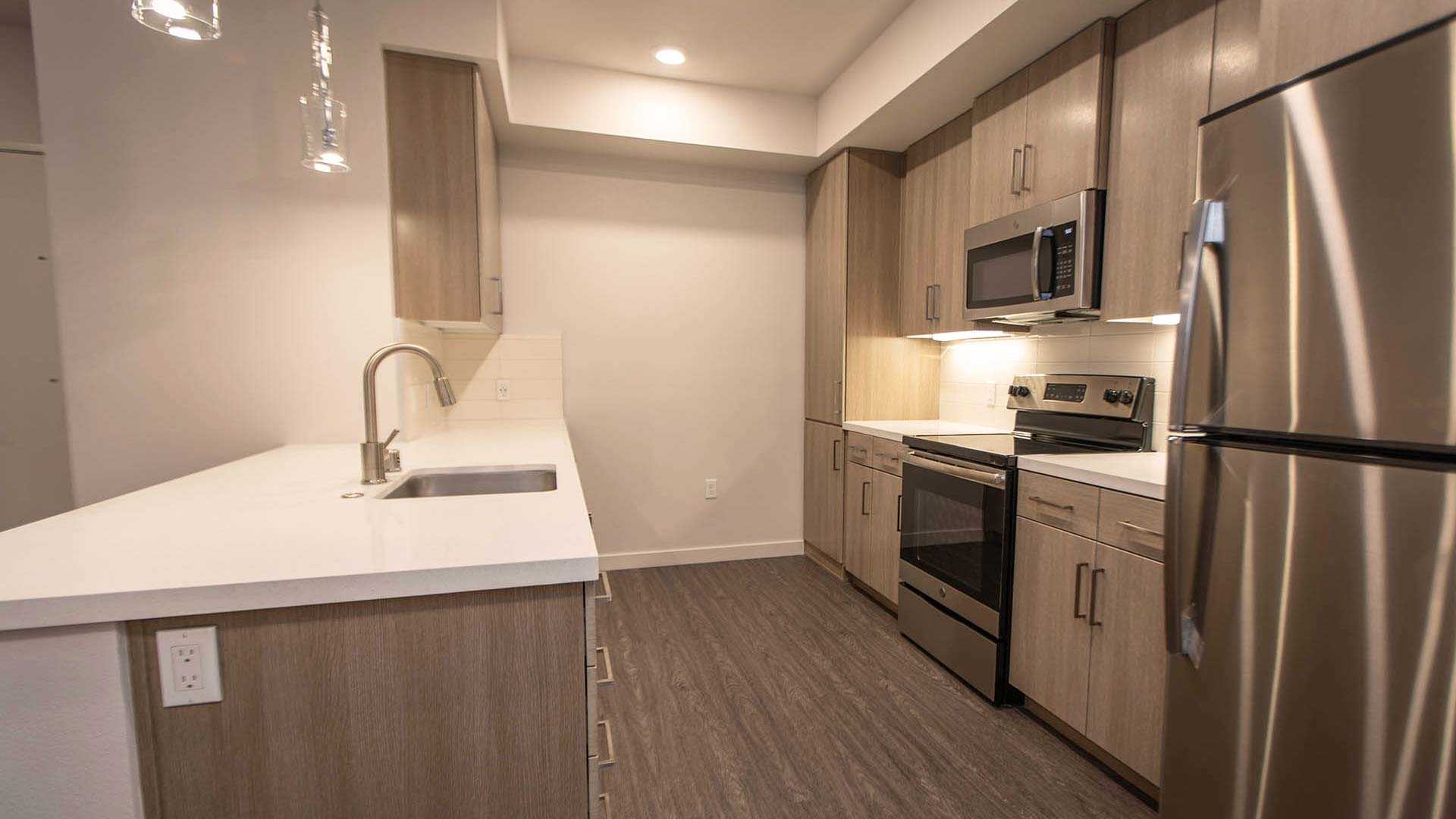 Mira plan H kitchen island view 1
