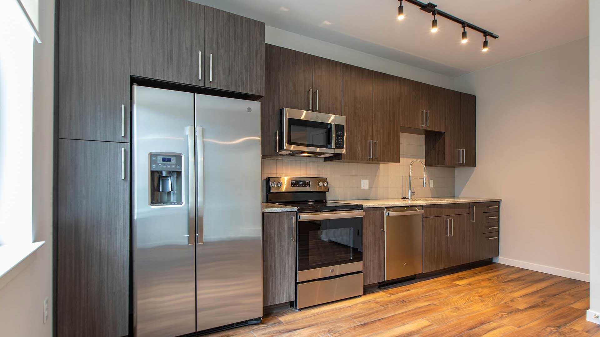 Reve apartments a1 kitchen area warm decor view