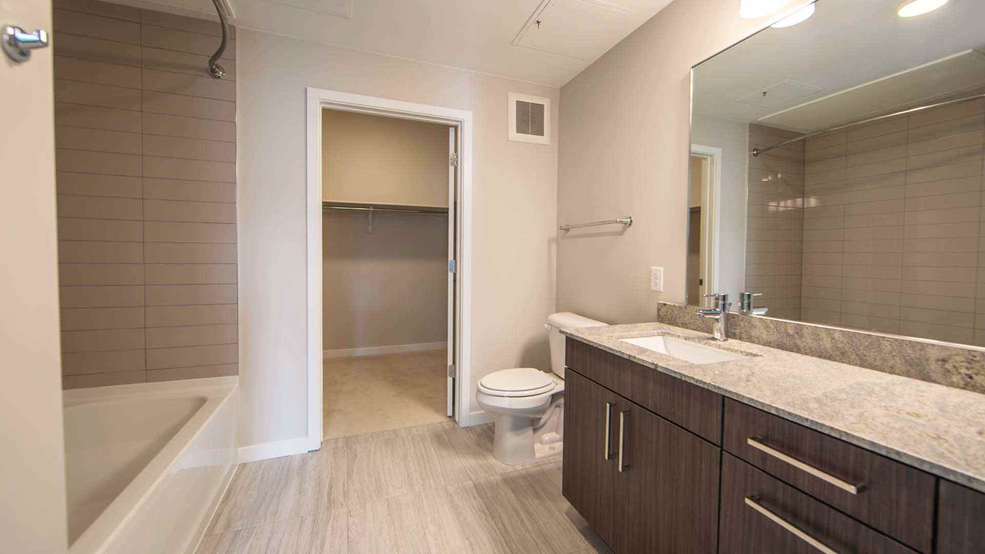 Reve apartments a3 bathroom warm decor view 1