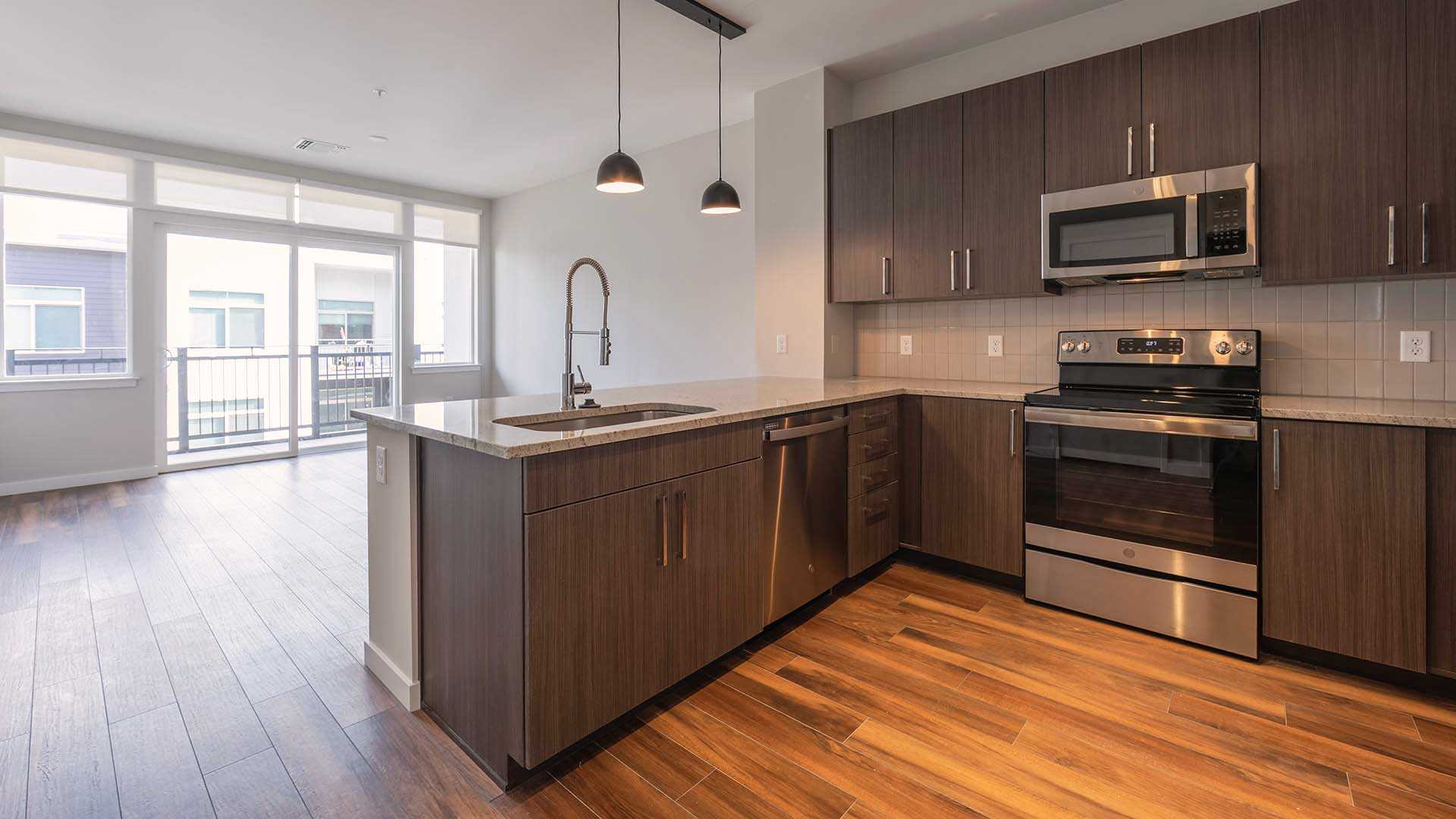 Reve apartments a3 kitchen island warm decor view