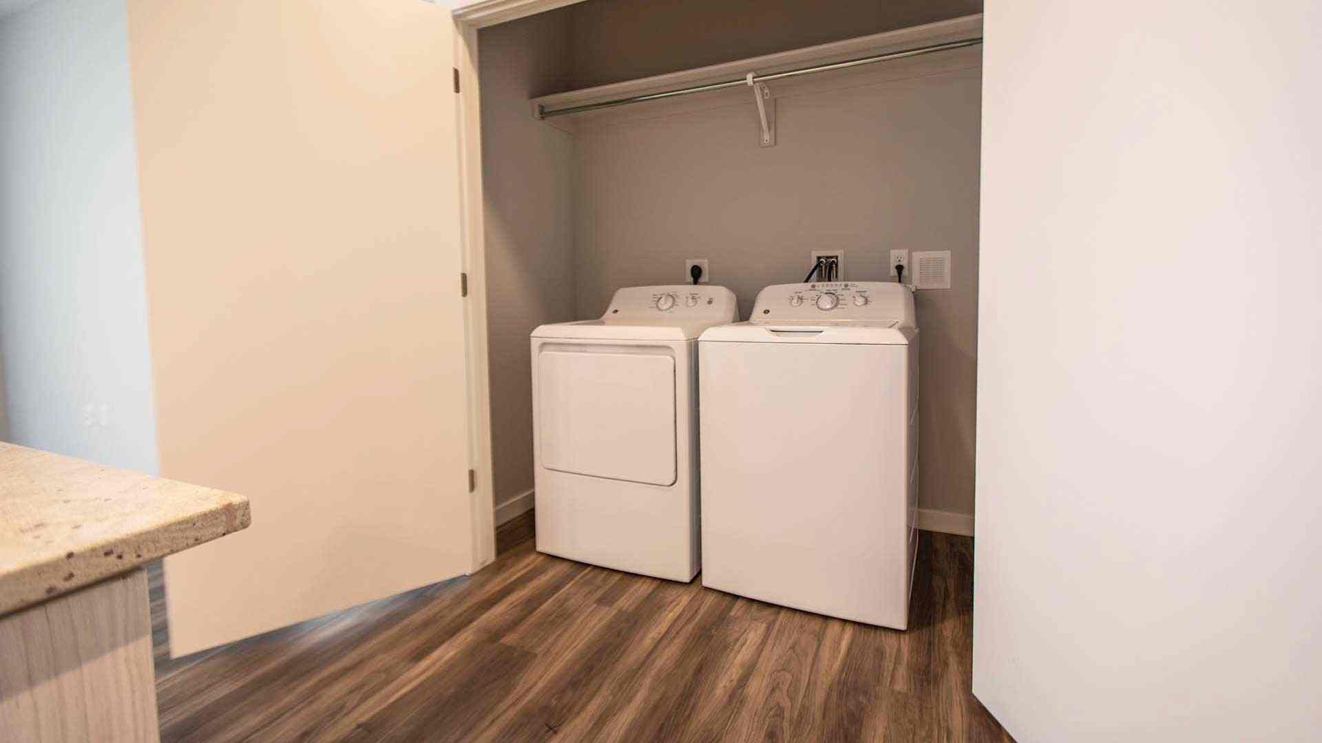 Reve apartments b1 laundry closet view