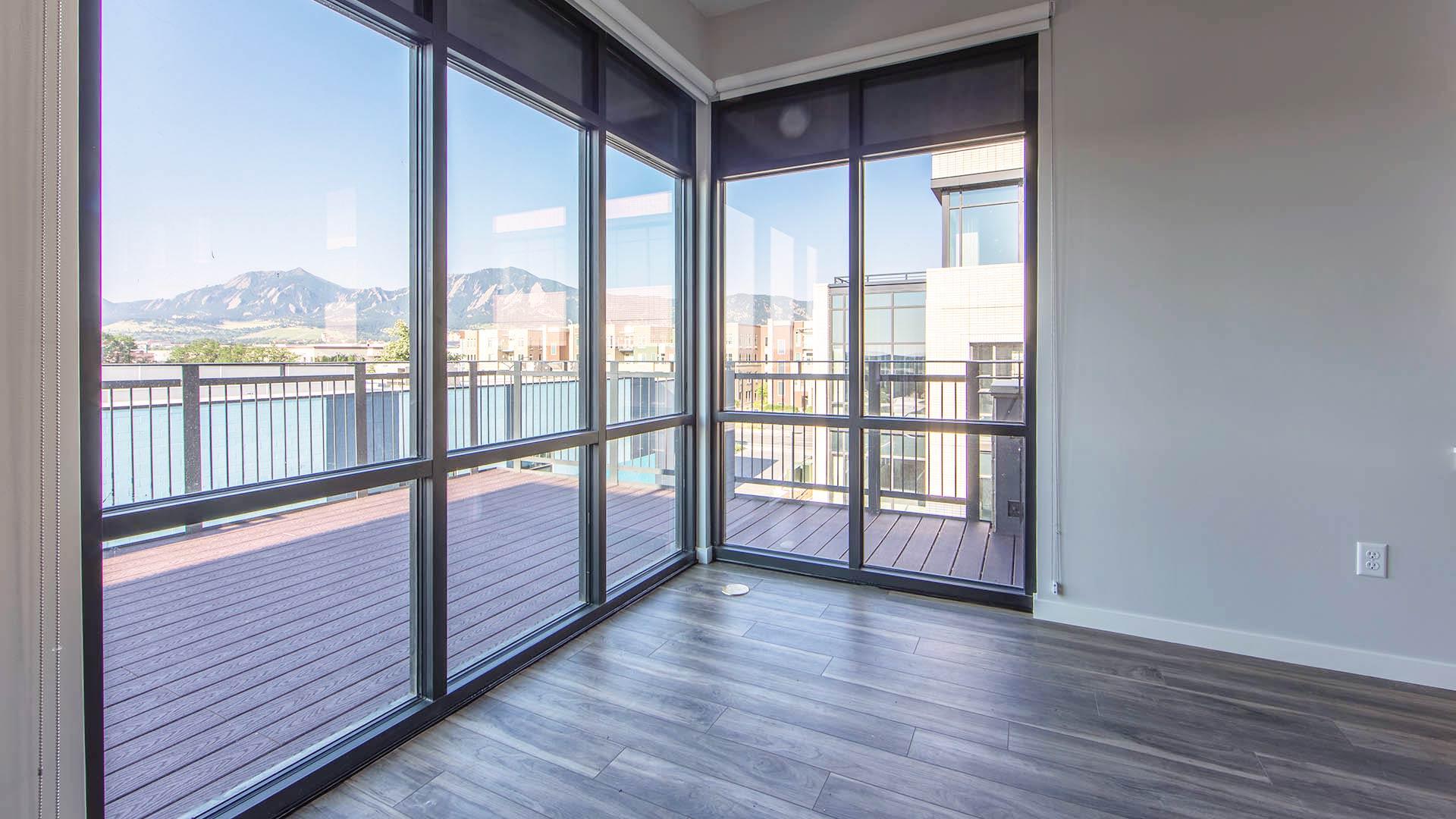 Reve apartments ph2 livingroom deck view