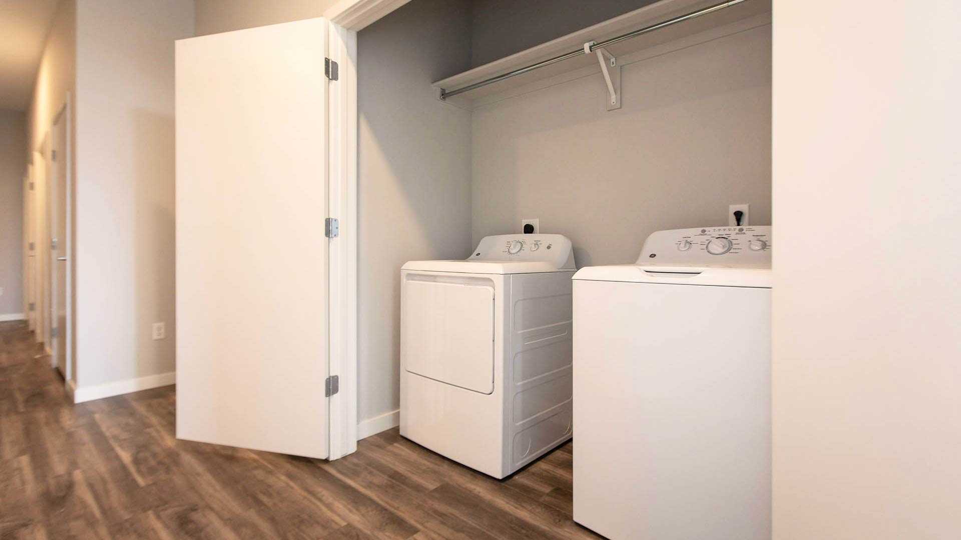 Reve apartments ph6 laundry closet view