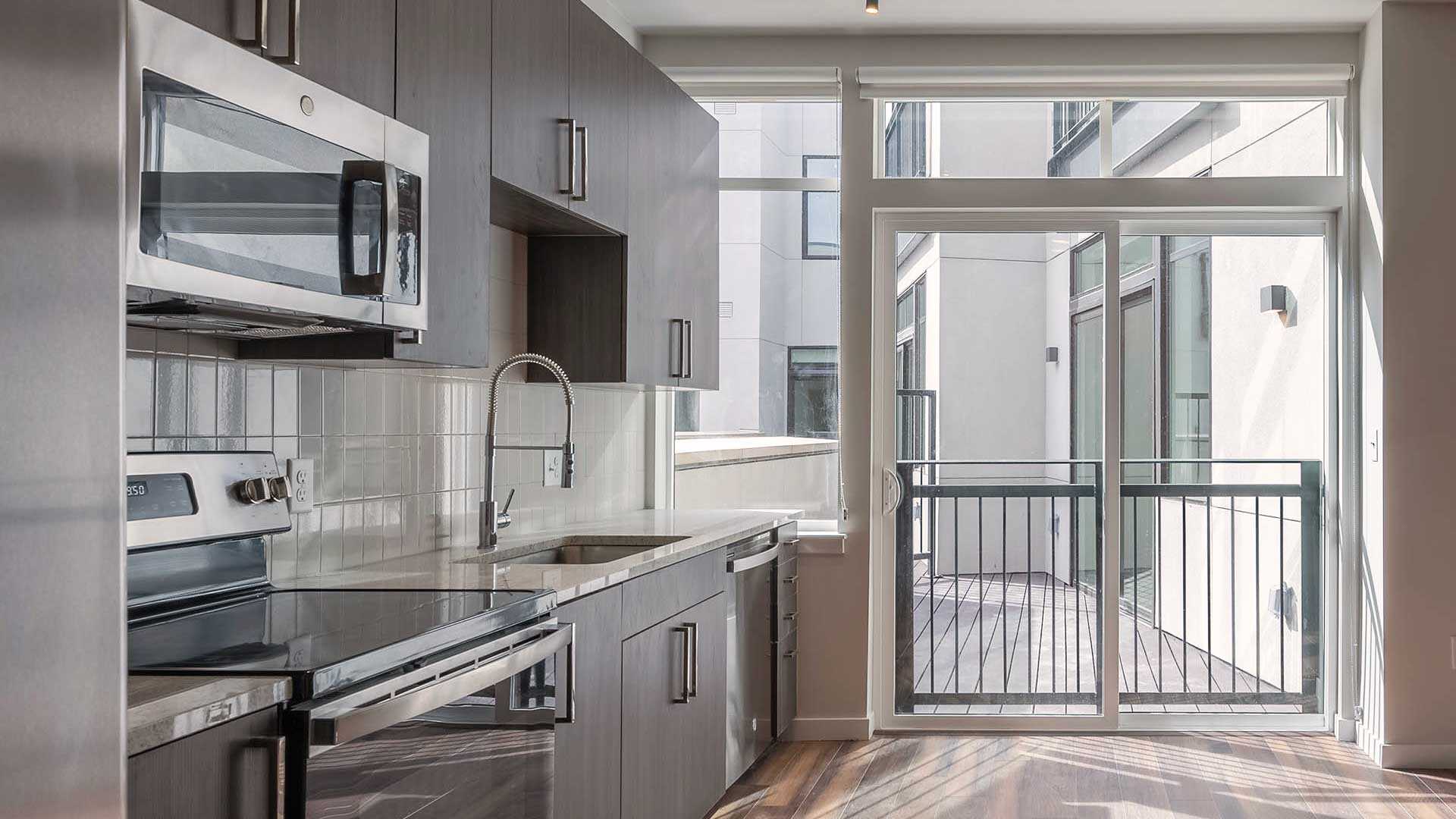 Reve apartments s4 kitchen balcony warm decor view 2