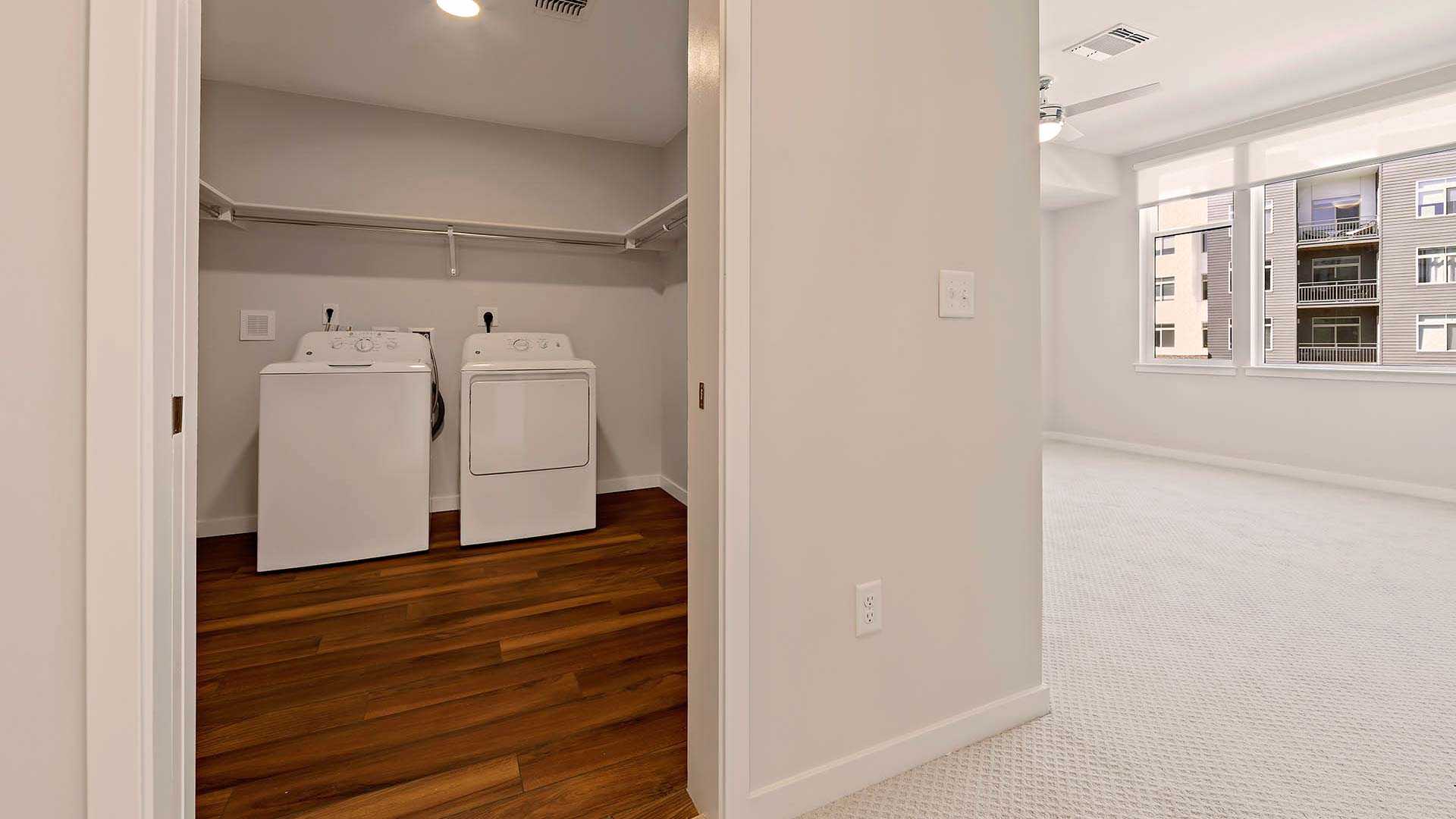 Reve apartments th1 laundry room view 1