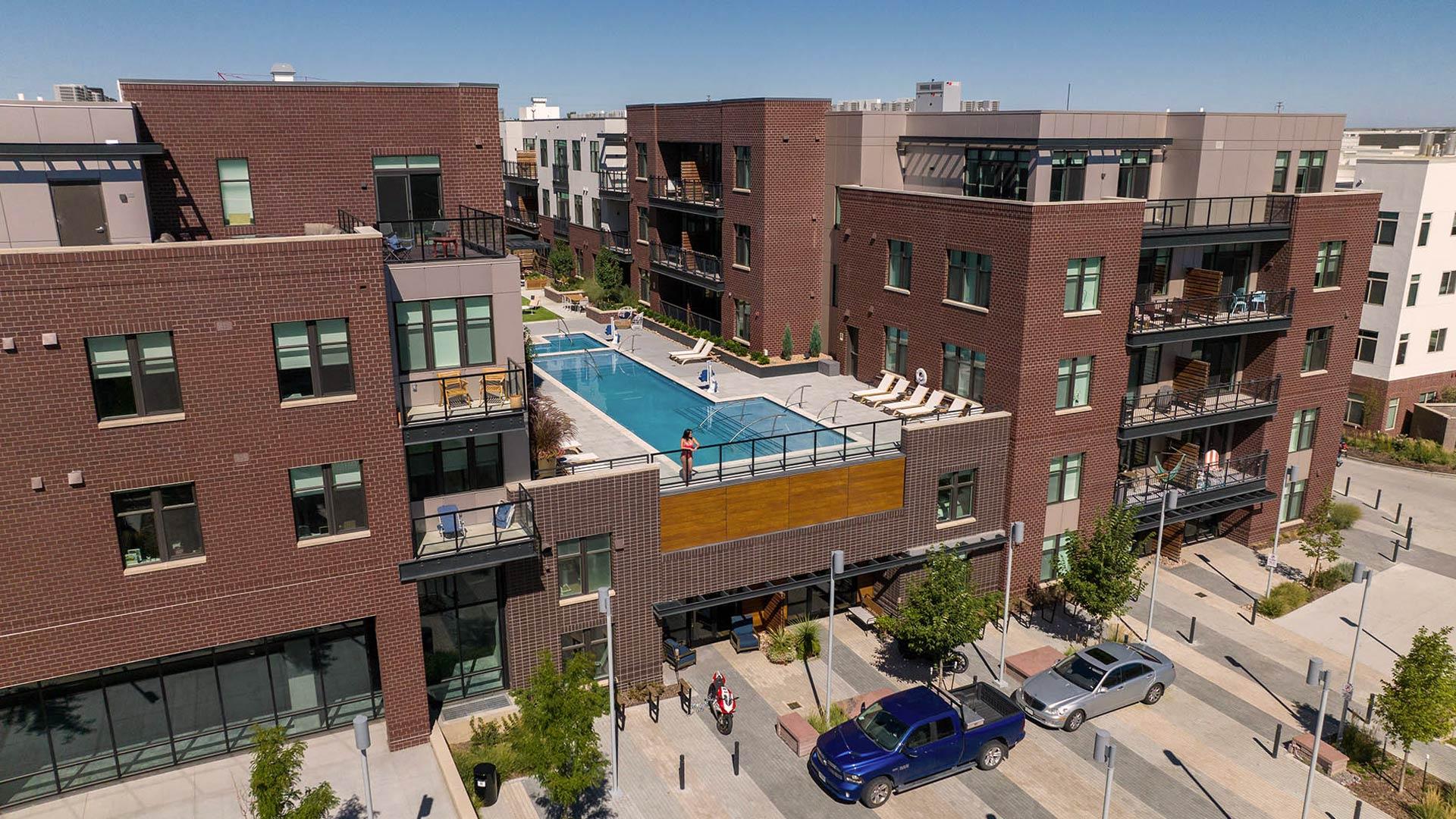Reve exterior pool deck aerial view 7