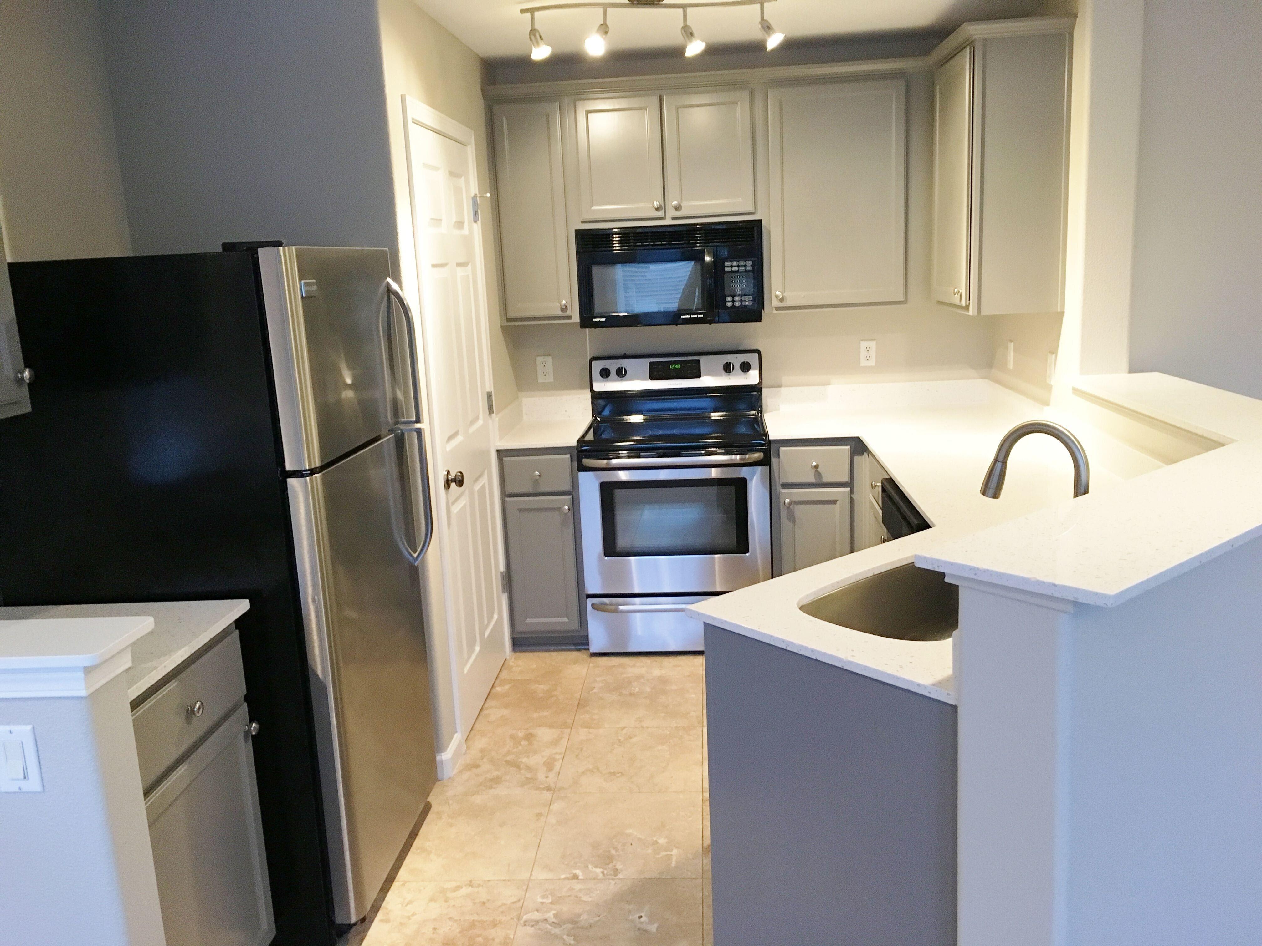 summerlinn-grey-cabinets-white-counter-kitchen